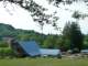 A different view of the main barn. If you look closely, our truck is visible to the right of the wing, as is the portable saw mill used for the demonstration