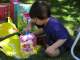 He really liked everything, but especially this piggy bank (with big plastic coins to put inside)