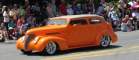 Studebaker maybe? It sure is orange, whatever it is. ☺