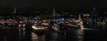 The boats jockey for position waiting for the Spirit of Seattle to finish its tour of Lake Union