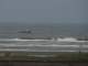 Another boat motoring up the beach