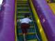 Flynn, climbing the slide at the annual LWUMC Neighborhood Picnic