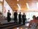 The wedding party awaits the bride